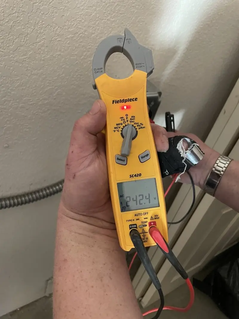Voltage testing with clamp meter during Recessed Lighting Installation in Arkadelphia